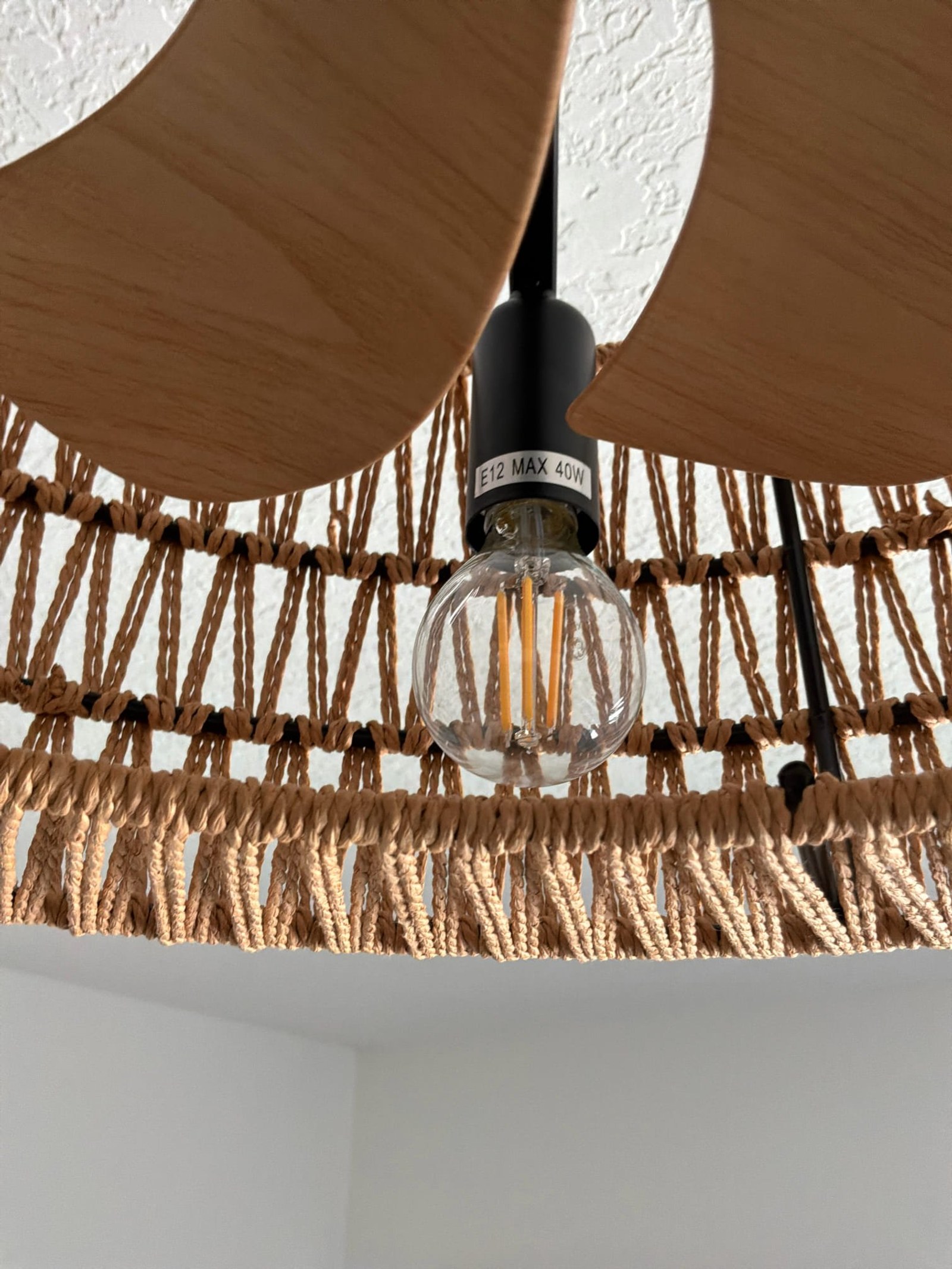 Ceiling fan with E12 base socket and fabric canopy showing completed installation.