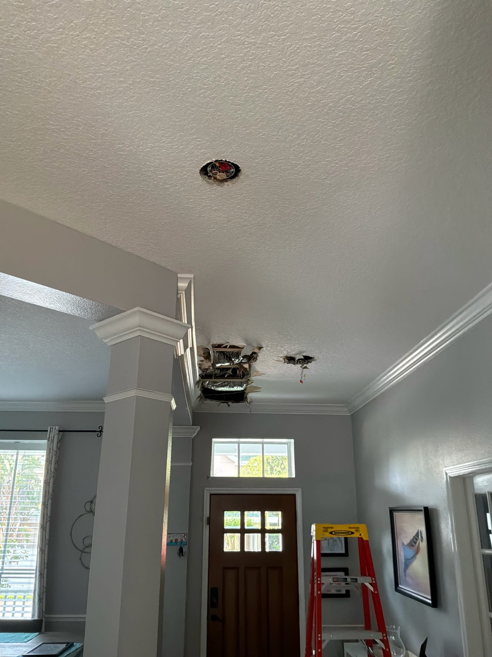 Ceiling-mounted wiring rough-in showing improperly installed junction box and incomplete wiring with exposed connections, missing smoke detector in required area.